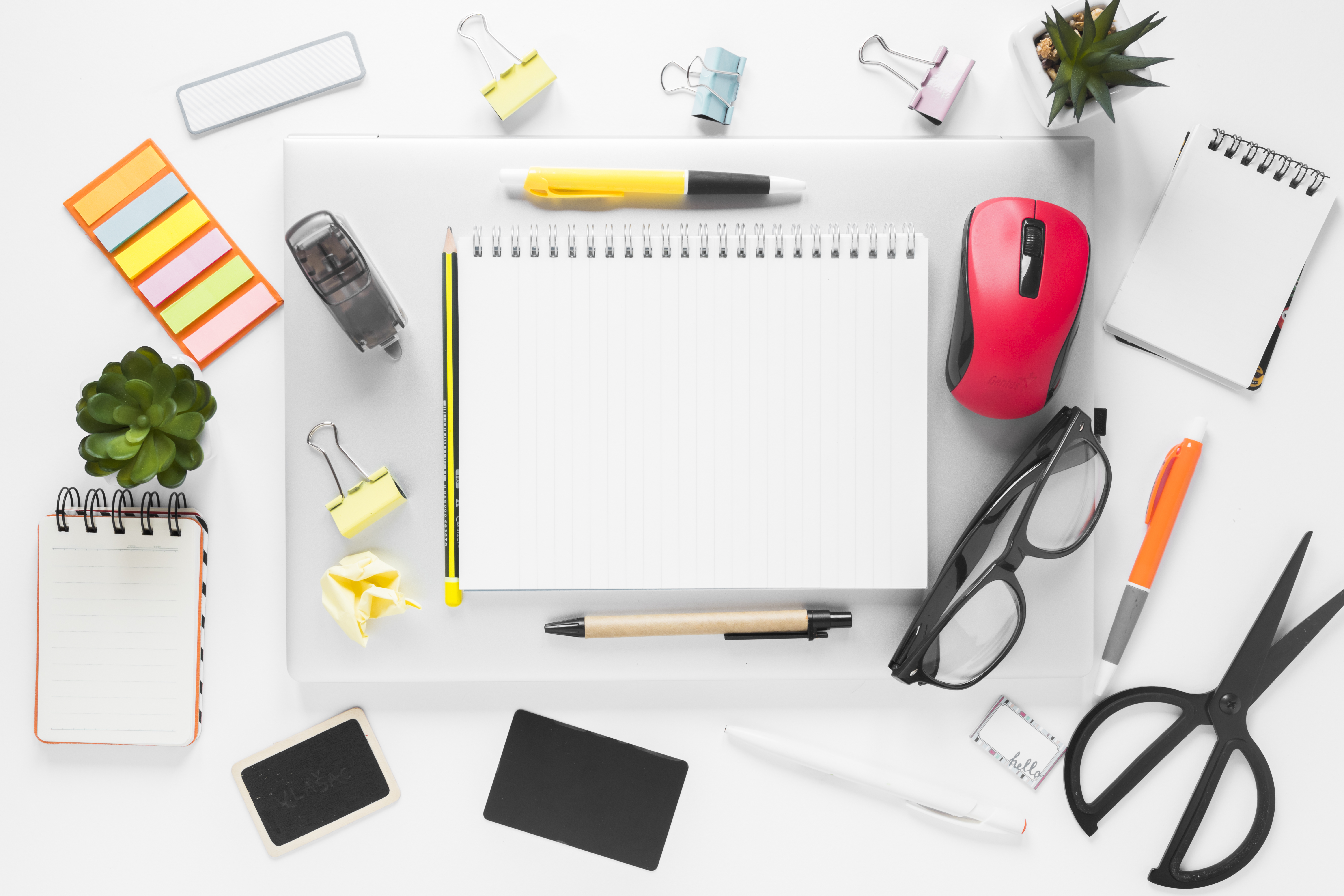 overhead-view-office-stationeries-laptop-white-background